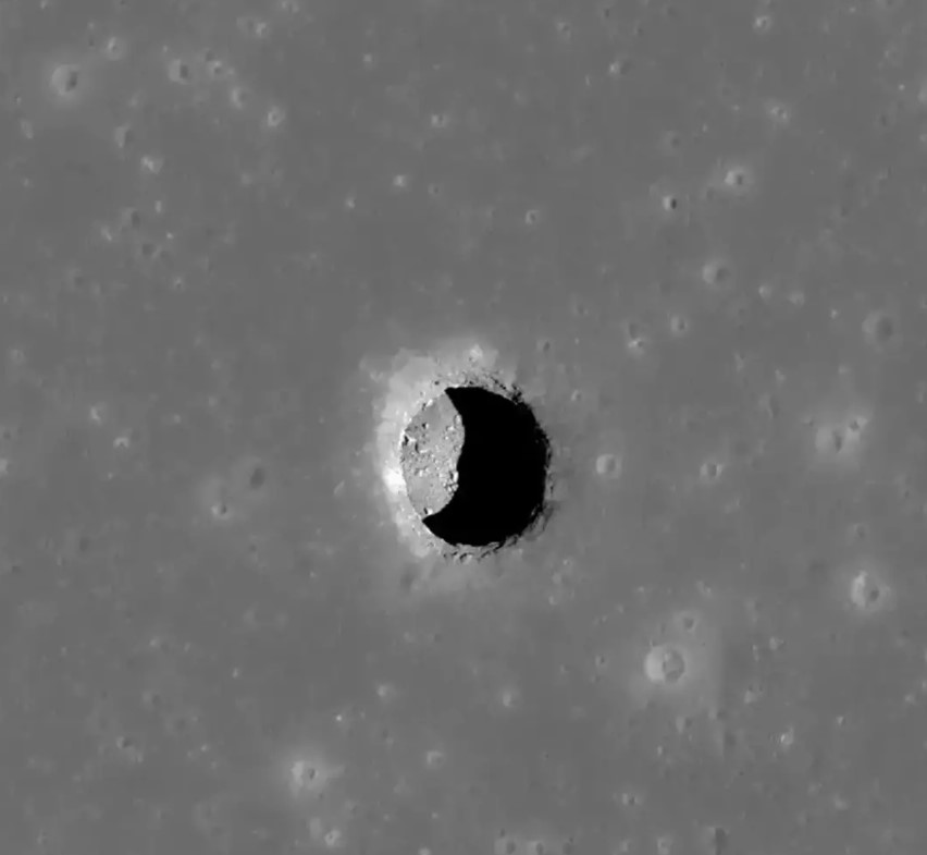 The newly discovered hole may represent a rare Martian oasis for ancient lifeforms. Image Credit: NASA