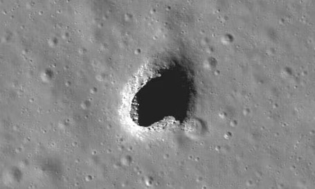 The crater-like opening is about 150 feet (45 meters) wide on the edge of Arsia Mons volcano. Image Credit: NASA