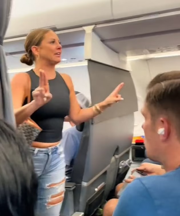 'Crazy plane lady' seen coming back on a flight after 'not real' incident one year ago 4