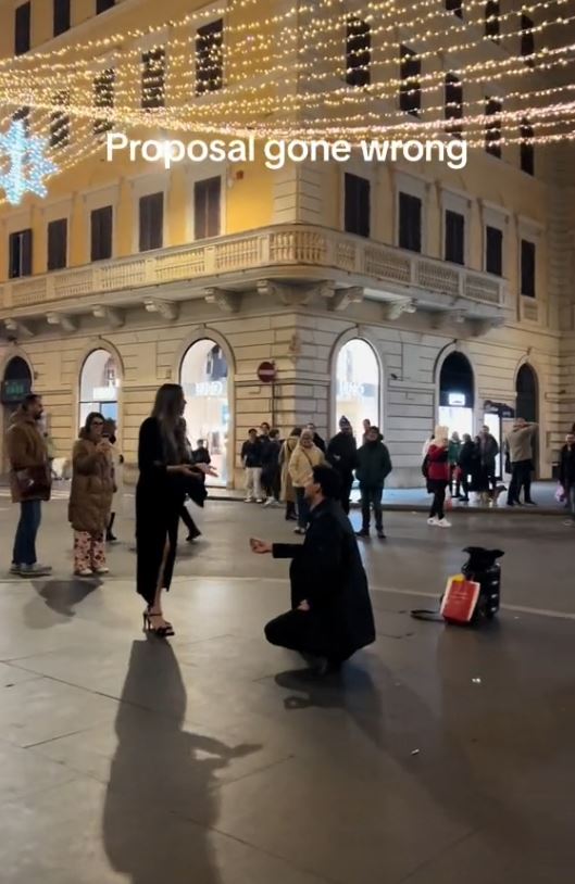 Valerio proposed to his girlfriend in Rome, Italy on Christmas Eve with a romantic setup in a public square. Image Credit: @herclueless/Tiktok