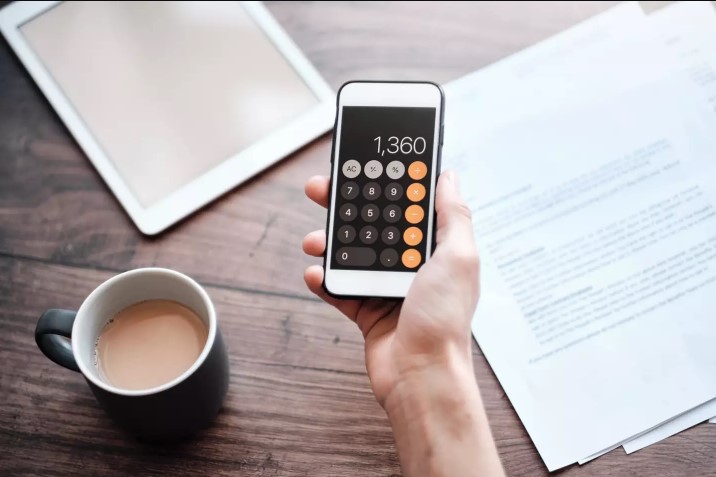 The app, disguised as a calculator, secretly stored private information in a secure vault. Image Credit: Getty