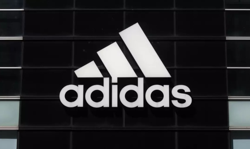 Adidas' stripes form a triangle, symbolizing challenges athletes overcome to achieve goals, say branding experts. Image Credit: Getty