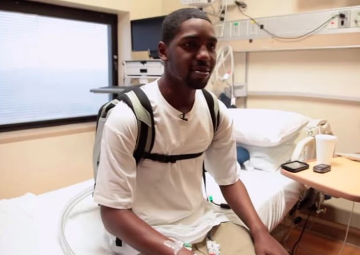 Doctors replaced Stan's heart with an artificial device powered placed in a backpack. Image Credit: CNN