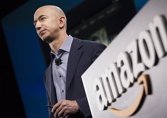 Commenters speculated on Amazon employees' discomfort as their boss checked their reports at the scene. Image Credit: Getty