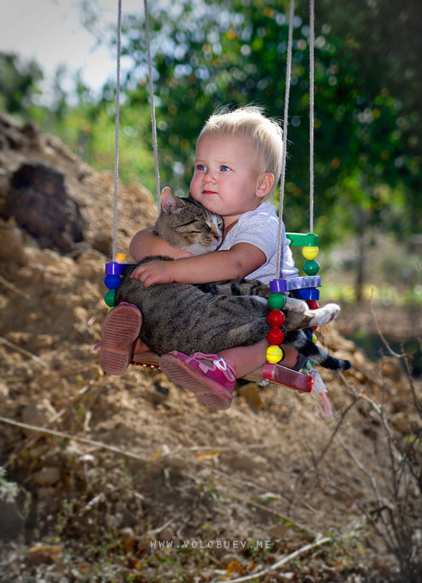 There is always a bond between a baby and a cat.