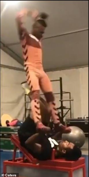 Astounding moment acrobat flips his partner through air with just his feet 2