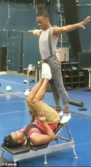 Astounding moment acrobat flips his partner through air with just his feet 4