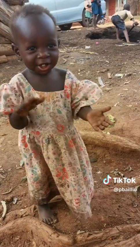 Charming baby girl's barefooted dance in open area goes viral on tikTok 2