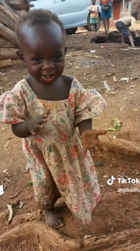 Charming baby girl's barefooted dance in open area goes viral on tikTok 4