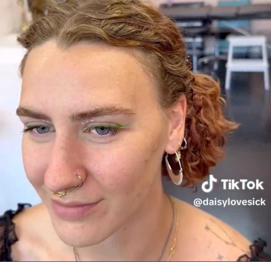 A woman gets fake freckles tattooed, with some predicting that they will 'age like a tramp stamp' 2