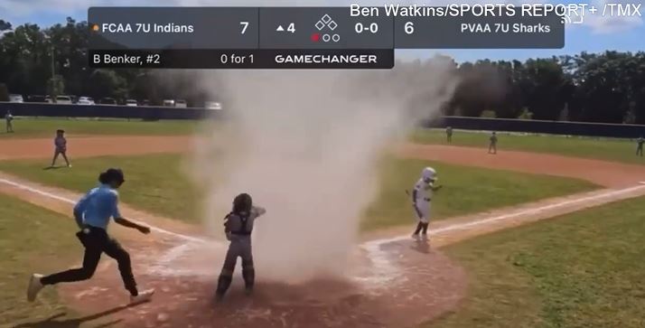  Florida umpire rescues 7-year-old engulfed by dust devil on the field 1