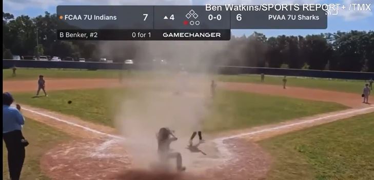  Florida umpire rescues 7-year-old engulfed by dust devil on the field 2