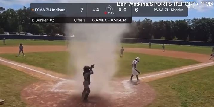  Florida umpire rescues 7-year-old engulfed by dust devil on the field 3