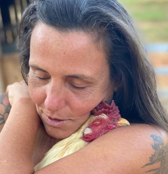  Rescued animals find solace in woman's arms when she sings to them 7