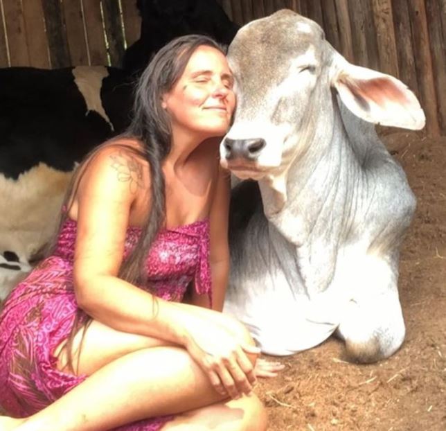  Rescued animals find solace in woman's arms when she sings to them 8