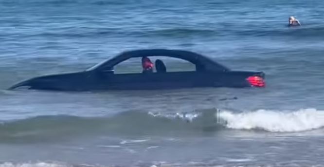  BMW found drifting out to sea after driver parks car on the beach 4