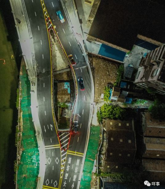 Unyielding house gets wedged between surrounding highway bridge 1