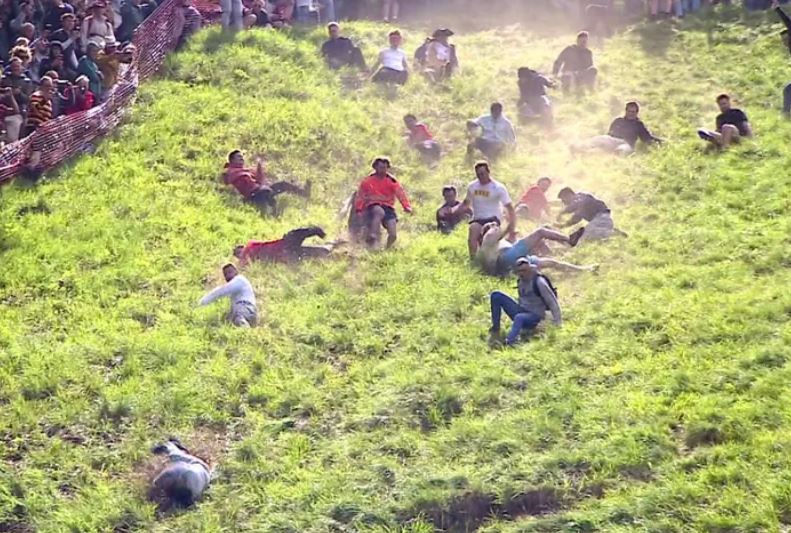 Canadian woman wins cheese rolling race despite being knocked unconscious 1
