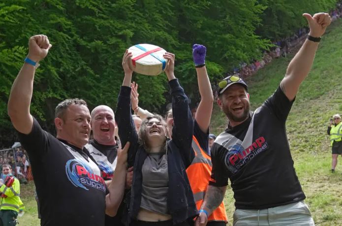 Canadian woman wins cheese rolling race despite being knocked unconscious 4