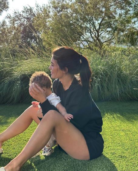 Kylie Jenner publicly unveils her 11-month-old son's face and reveals regret over naming him 'Wolf 2