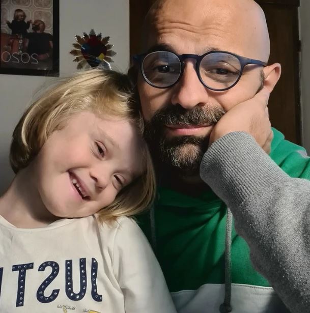 Gay single father adopts girl with Down syndrome and witnesses her incredible growth 5