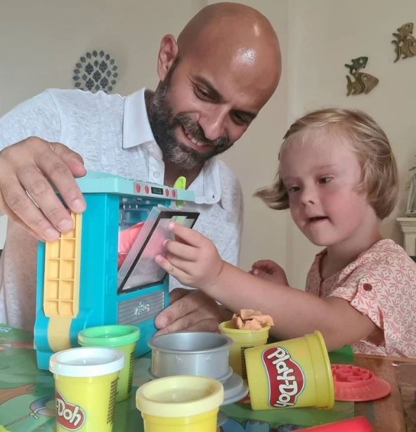 Gay single father adopts girl with Down syndrome and witnesses her incredible growth 8