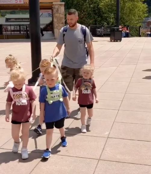 'They are not dogs' Dad sparks online debate after using leash to take his five-year-old quintuplets for a walk 1