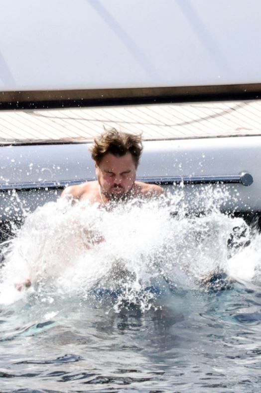 Shirtless Leonardo DiCaprio shows off his toned torso and enjoys his vacation family on superyacht 5