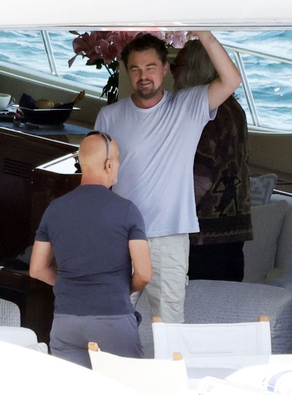 Shirtless Leonardo DiCaprio shows off his toned torso and enjoys his vacation family on superyacht 6