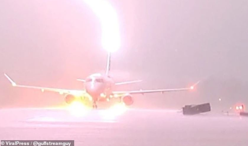 SHOCK moment: Lightning strikes plane full of passengers during stormy landing 2