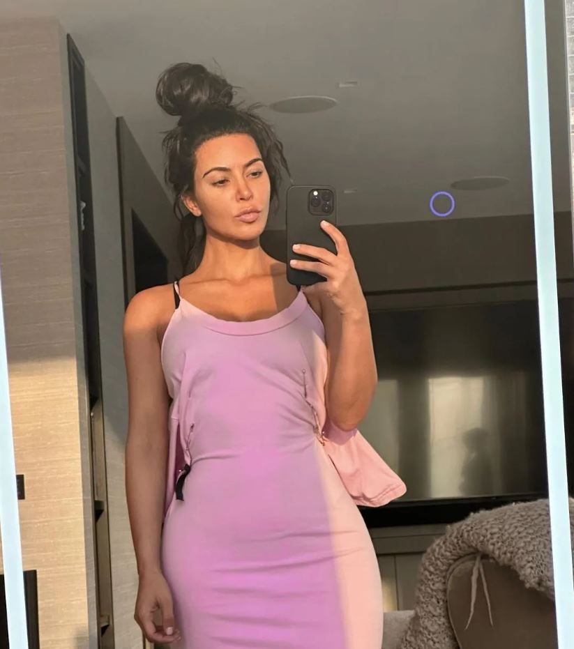 Kim Kardashian is 'freaking out' after spotting a spooky figure in her selfie while alone at home 1