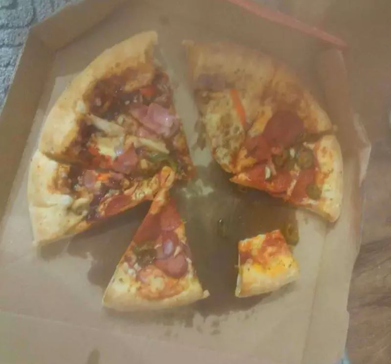 Mother is left fuming after hunting down Domino's pizza delivery to find pizza 'half eaten' 2