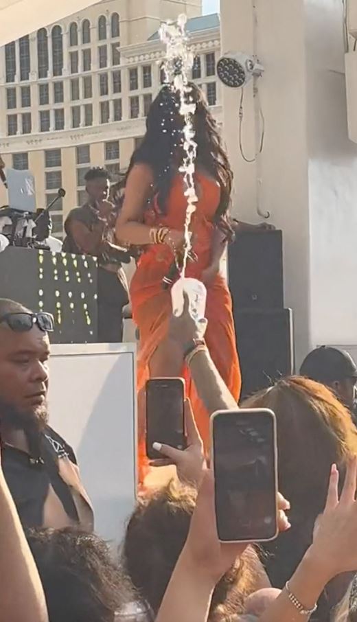 Rapper Cardi B tosses microphone at fans who threw a drink at her in Vegas 1