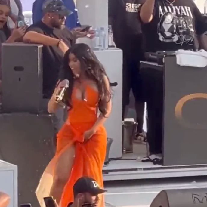 Rapper Cardi B tosses microphone at fans who threw a drink at her in Vegas 2