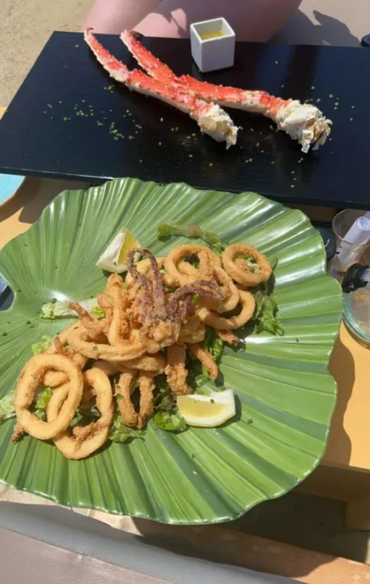 Tourists were stunned after being charged £450 for two drinks and squid 2