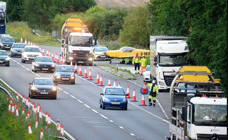 Plane makes emergency landing in the middle of busy dual carriageway, bringing traffic to a standstill 4