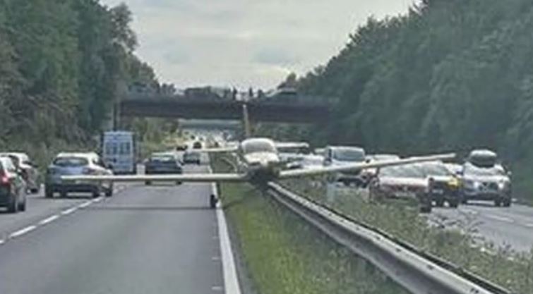 Plane makes emergency landing in the middle of busy dual carriageway, bringing traffic to a standstill 5