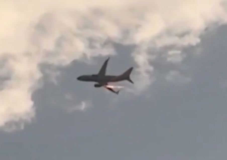 Passengers fearing 'it's gonna go down' after spotting flames shoot from underneath airplane 1