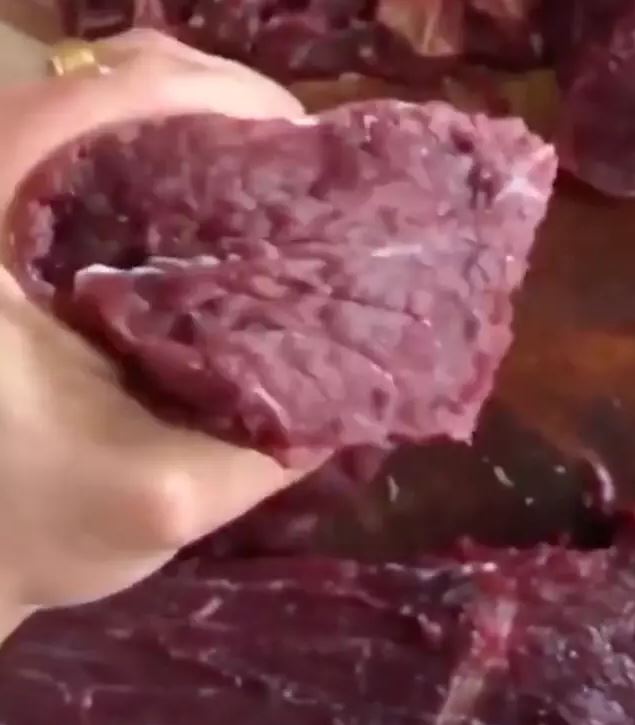 In 2020, Jackson, a Gfycat user from the US, posted a video depicting a butcher's interaction with a spasming piece of freshly cut, salt-coated meat.