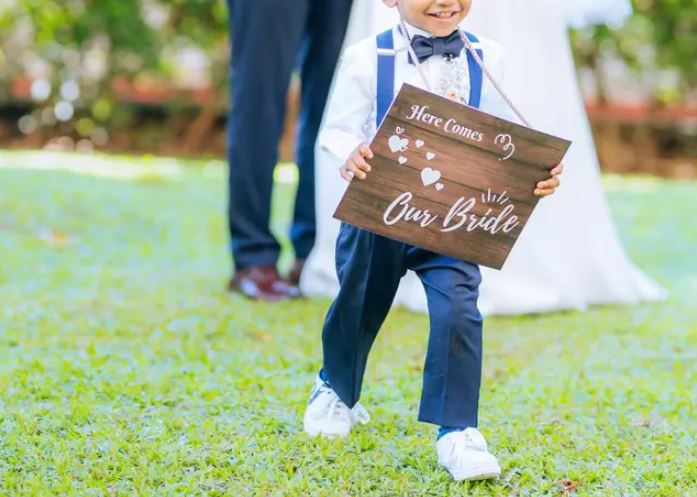 Bride threatens to kick groom’s 6-year-old nephew out of wedding reception after he wore white 3