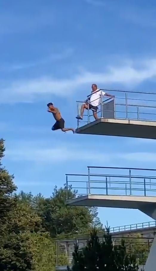 Lifeguard kicks boy off a 10m high dive board after he refuses to come down 2