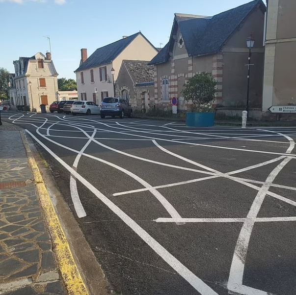 Village paints 'SQUIGGLY LINES' on roads to stop cars driver from speeding 1