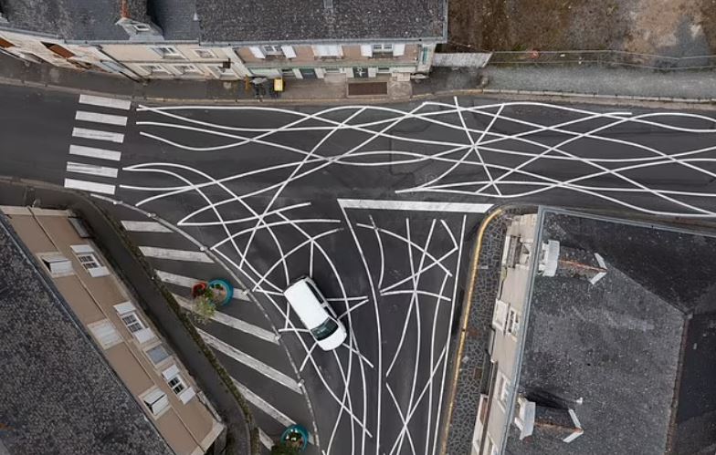 Village paints 'SQUIGGLY LINES' on roads to stop cars driver from speeding 2