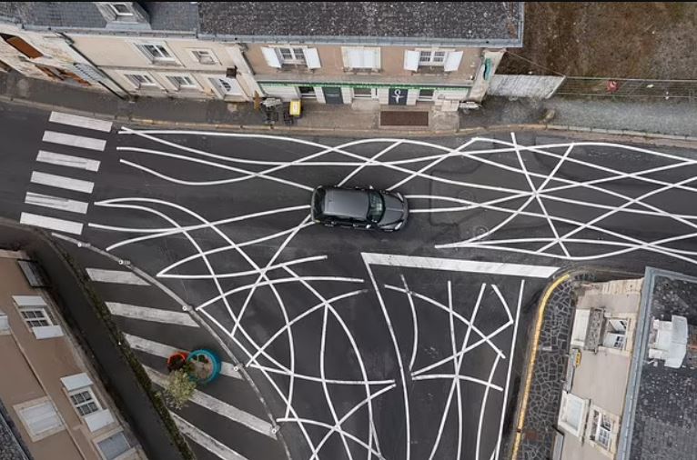 Village paints 'SQUIGGLY LINES' on roads to stop cars driver from speeding 4