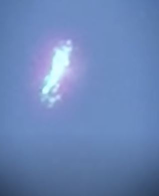 Eerie footage shows UFO 'splits in two' before mysteriously vanishing and then resurfacing 4