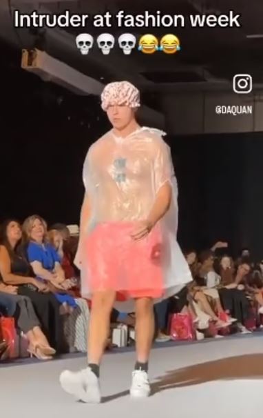 Nobody noticed an imposter wearing a TRASH BAG as he crashed the New York Fashion Week catwalk until security stepped in 1