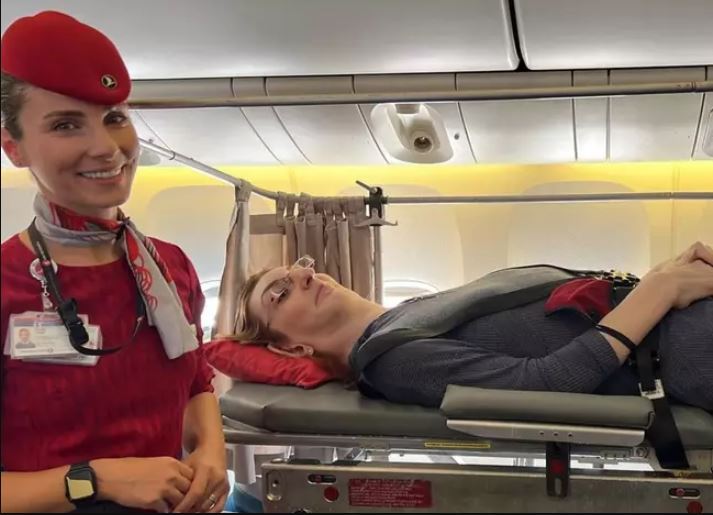 Airline removes six seats as world's tallest woman flies on plane for first time 1