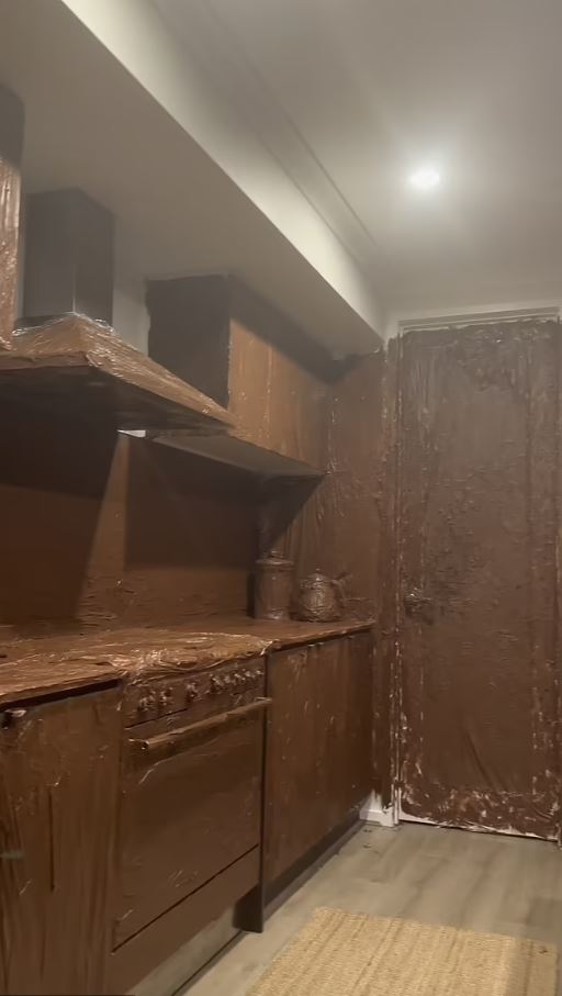 Prankster risked the wrath of his parents by covering their kitchen in chocolate 1