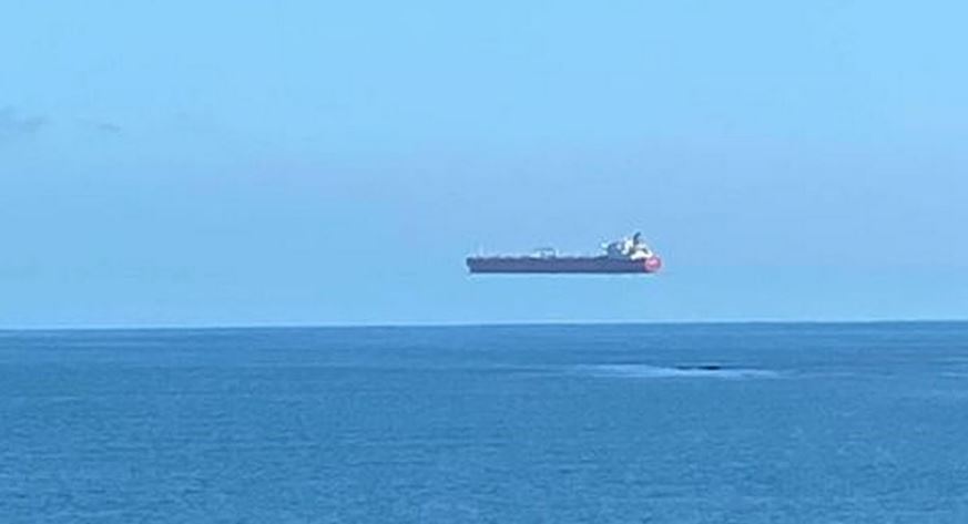  Ship appears to be sailing across the sky in bizarre optical illusion 3