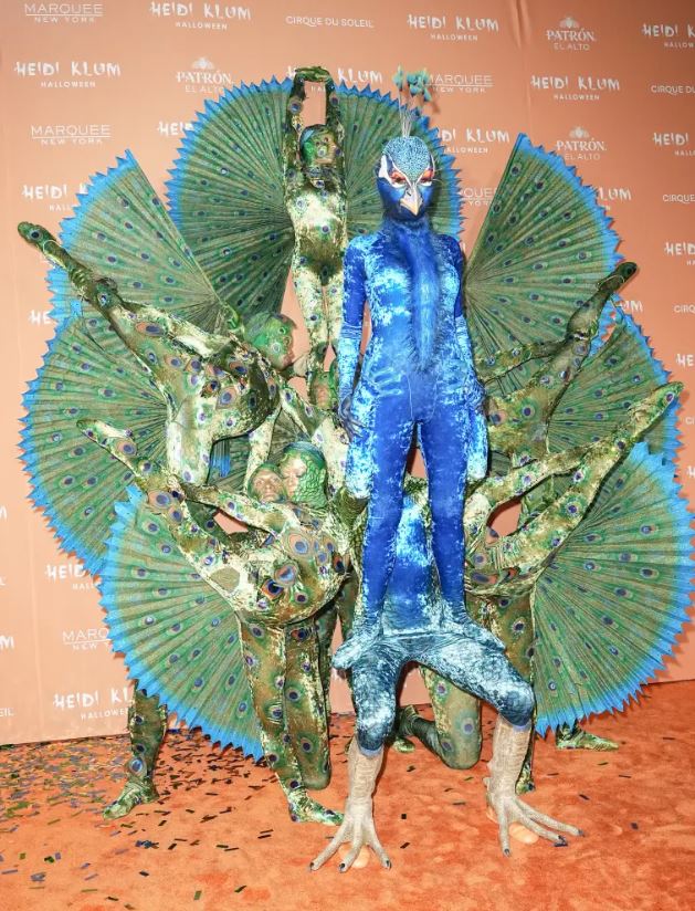 Husband Tom Kaulitz completely upstages Heidi Klum's peacock costume for the first time ever 1